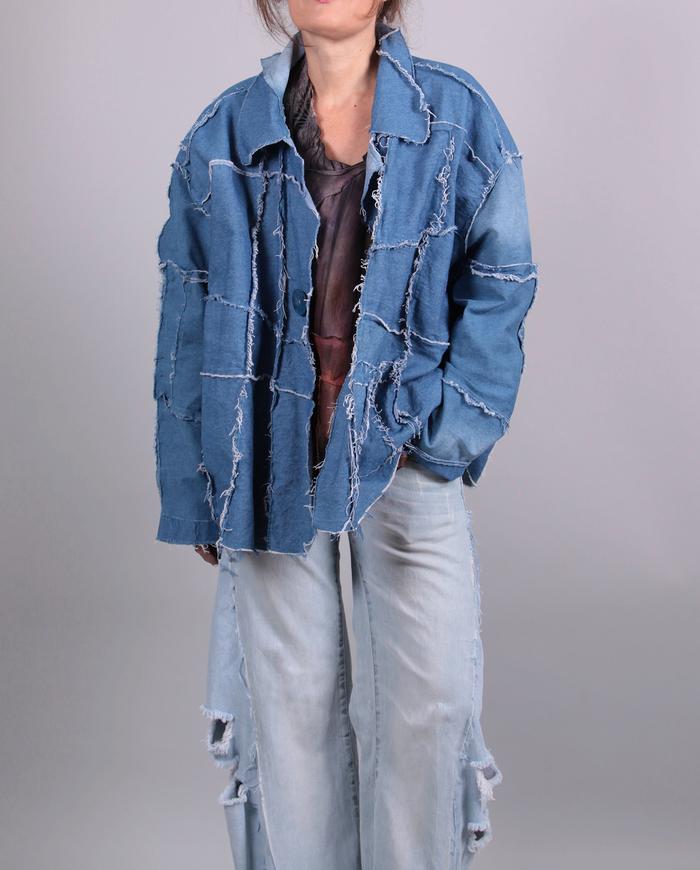 'stitched up' oversized denim jacket