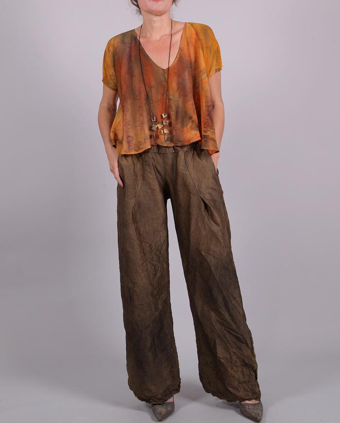 'almost a straight shooter' distressed textured silk pants